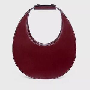 staud moon bag in raspberry